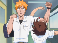 Ichigo knocks down Keigo with his outstretched arm.