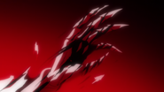 Nnoitra's hand bursts from Kenpachi's back.