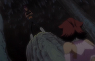 Yoruichi appears on a rock pillar next to Haineko.