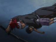 Renji lies unconscious alongside the boy.