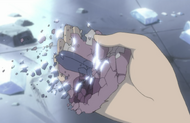 A frozen fragment of Shunsui's kimono crumbles in Renji's hand.