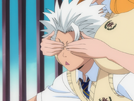 Rangiku surprises Hitsugaya from behind.