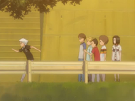 Karin and her friends watch as Hitsugaya runs off.