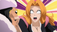 Rangiku angrily grabs Kanonji.