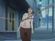 Heita angrily binds his mother with his Chain of Fate.