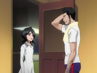 Rukia encounters Isshin in the hallway.