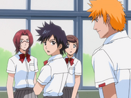 Chizuru and Michiru watch as Tatsuki denies knowing who Orihime is.