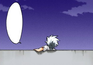 Hitsugaya sits on the roof of Orihime's apartment.