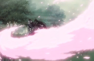 Senbonzakura sends a flurry of blade petals toward Uryū.