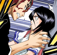 Renji pins Rukia against a streetlamp when she tries to go to a fallen Ichigo's side.