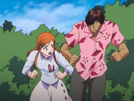 Orihime and Sado run toward Ichigo's location.