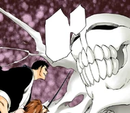 Isshin enters Masaki's subconscious and saves her from her inner Hollow by tying her Soul to his own.