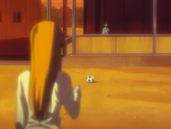 An invisible Orihime attempts to approach Tatsuki.
