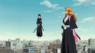 Rangiku being assisted by Hinamori