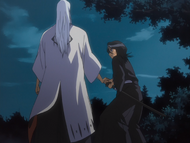 Ukitake stops Rukia from intervening.