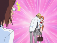 Shinji Hirako hugs Orihime for remembering his name.