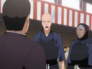 Ikkaku protests the match ending without him getting to fight.