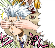 Rangiku surprises Hitsugaya by covering his eyes from behind.