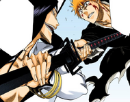 Nnoitra grabs Ichigo's sword by the blade without injury.