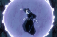 An icy circle forms on the wall behind Byakuya.