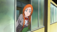 Orihime hangs out the window.