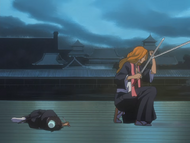 Rangiku protects Hinamori from Gin's attack.