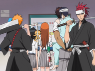 Renji and his friends examine a map of the hospital.