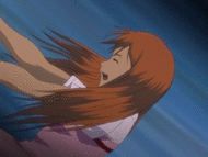 Orihime catches herself from falling.