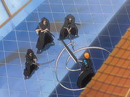 Ichigo is confronted by three possessed Shinigami.