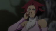 Haineko rubs her face where Yoruichi kicked her.