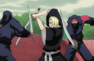 An assassin slashes Izuru.