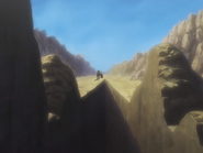 Ichigo cuts a large chasm into the ground with his attack.