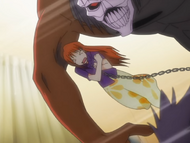 Orihime frees Tatsuki from Acidwire's grasp.