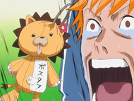 Kon sees his plushie body on Jinta's waist.