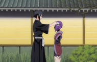 Nanao puts the last plum blossom in the violet-haired girl's hair.