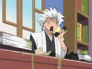 Hitsugaya sees his broken cup spilling tea on his paperwork.