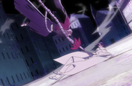 Renji stabs his blade into Uryū's stomach.