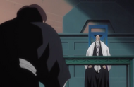 A Shinigami kneels before Yamamoto.