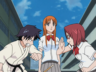 As Chizuru and Tatsuki argue, Orihime notices something is wrong.