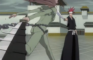 Saru moves in front of Renji.