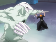 Ichigo struggles against the Hollow.