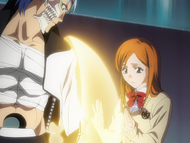 Orihime regenerates Grimmjow's arm.