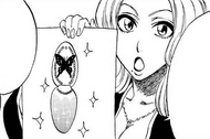 Rangiku holds up her design for a new Denreishinki.