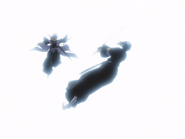 Hitsugaya reluctantly defends himself by knocking Momo away.