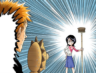 Ichigo is shocked to see Rukia bringing the school's bathroom broom to clean Kon with.