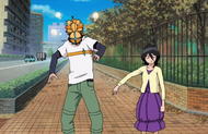 Rukia Kuchiki throws Kon at Ichigo.