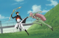 The Boomerang Tōjū leaps back as Saru slashes at him.