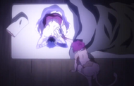 Haineko attempts to comfort Narunosuke as he glows with blue Reiatsu and screams in pain.