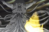 Kenpachi's Reiatsu flares up near the monster.