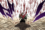 A grievously wounded Renji falls over in a shower of blood.